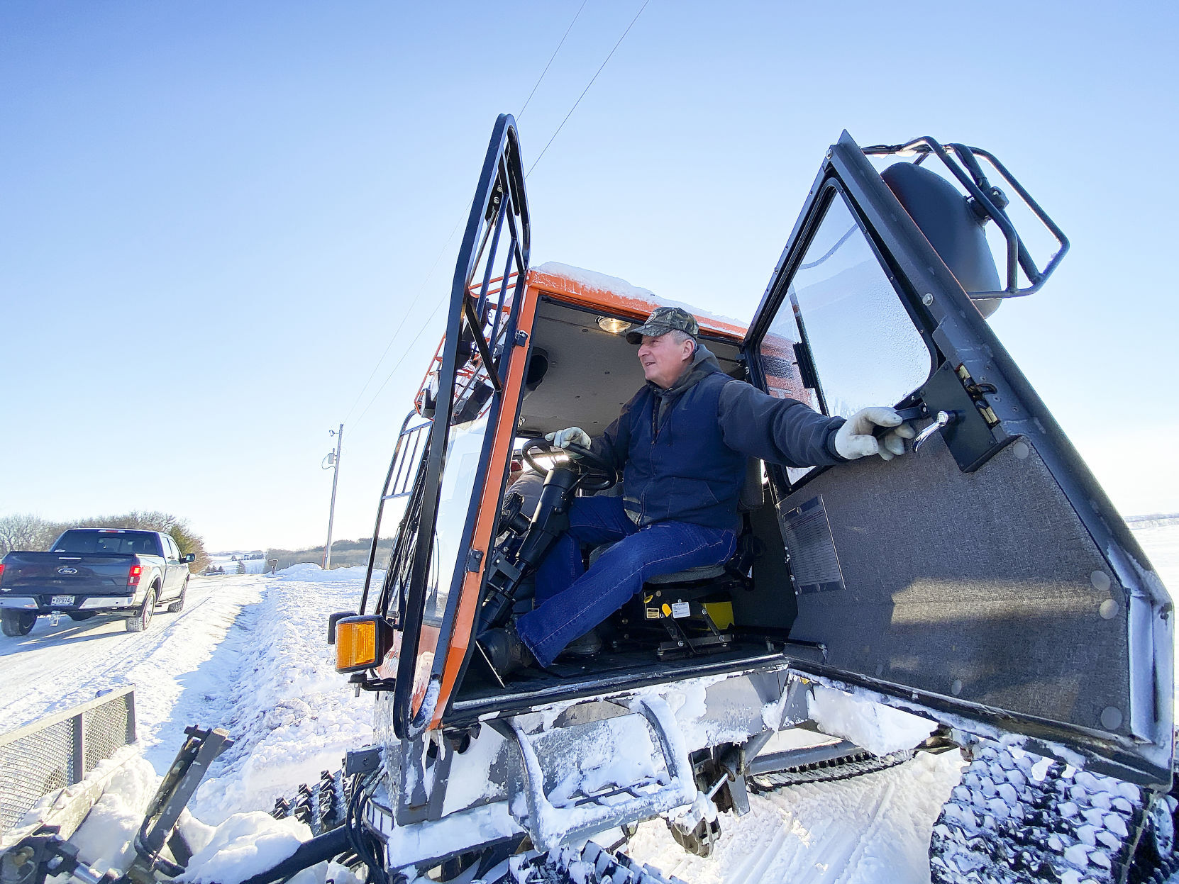 Grooming the snowmobile trail